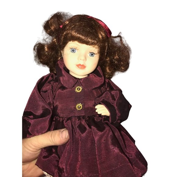 Cute Bright Eyed Brunette Porcelain Doll (Sitting Position) - Burgundy Dress - Picture 2 of 6